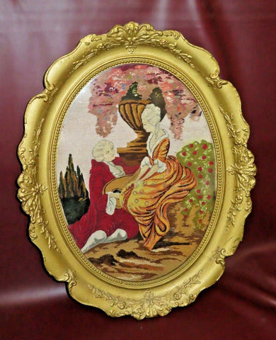 Antique French Style 30" Tall Oval Gilt Framed Needlepoint Couple in Courtyard