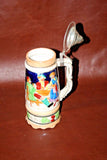 Vintage German Flip Lid 9.5" Pottery Musical Stein w/ Pub & Castle Scene