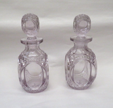 Antique Pair Ornate 8" Turning Purple Diamond Cut Glass Decanters w/ Stoppers