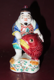 Vintage 6" Tall Japanese Hand Painted Buddha Figure w/ Large Fish - Finger Chips