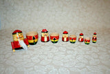 Vintage 5.5" Hand Painted 5-Piece Red Nutcracker Santa Russian Stacking Doll Set