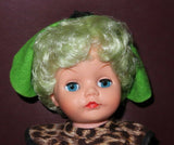 Collectible 12" Tall Kaysam Drinks & Wets Baby Girl Doll in Green Dress w/ Hat